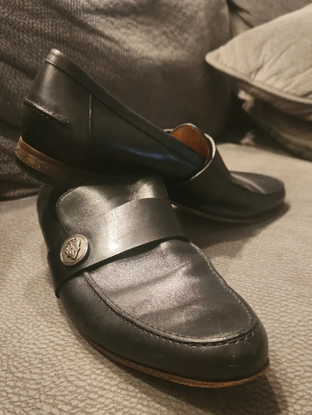 Gucci Vintage Black Leather Loafers with Silver Crest Medallion